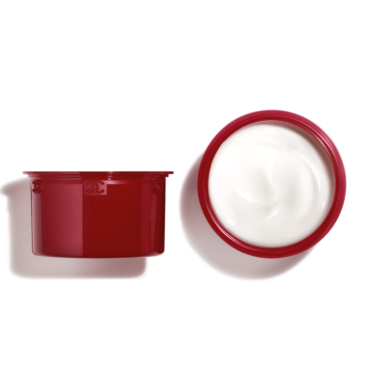Crème visage Chanel JEUX DE LUMIÈRES 50 g en pot rouge, texture crème à l'intérieur, idéal pour la beauté féminine.