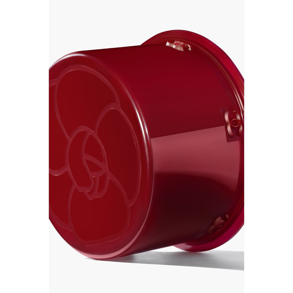 Pot de crème visage Chanel JEUX DE LUMIÈRES 50 g avec design floral élégant et emballage durable.