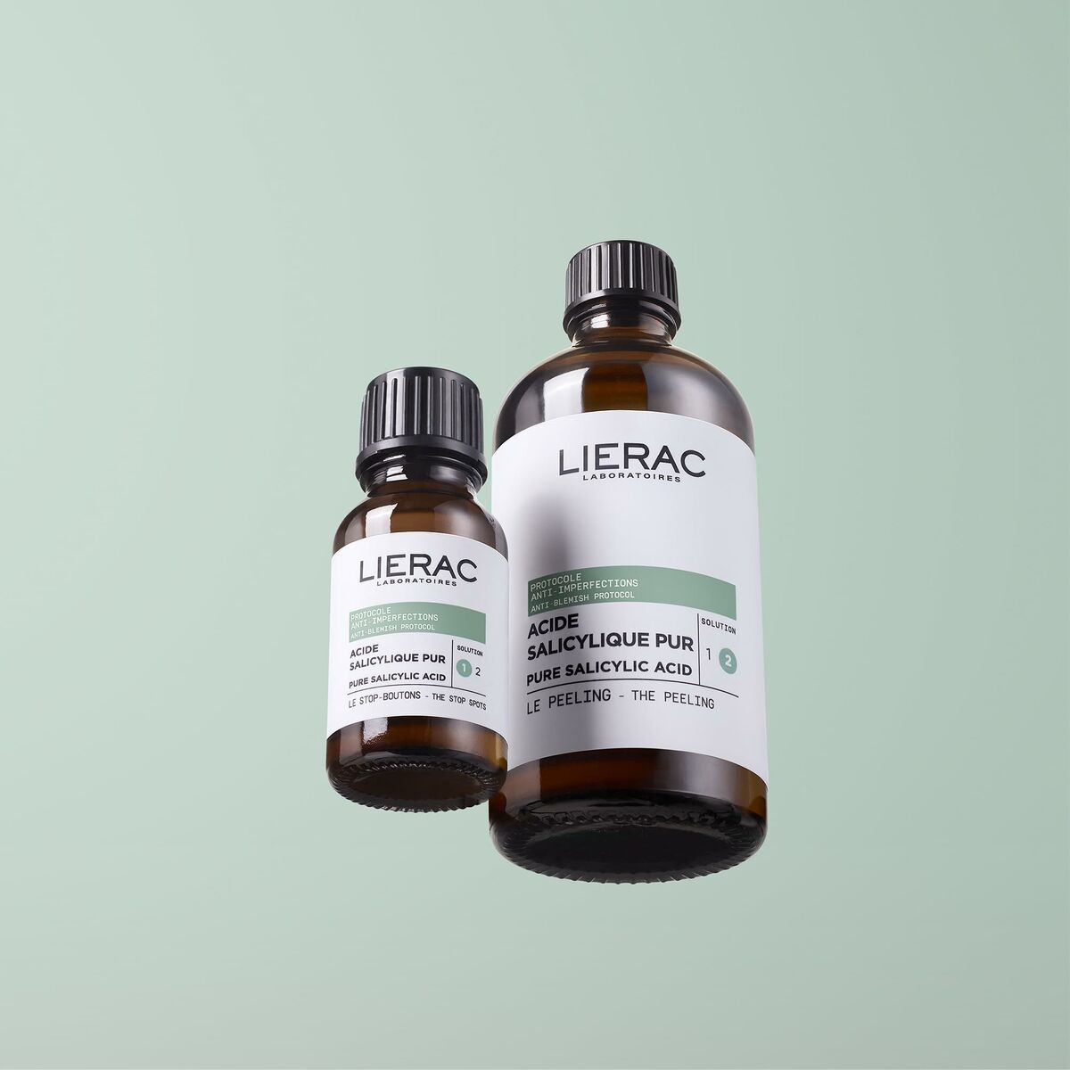 Bottles of Lierac salicylic acid exfoliant for skin care, featuring a sleek design and clear labels.