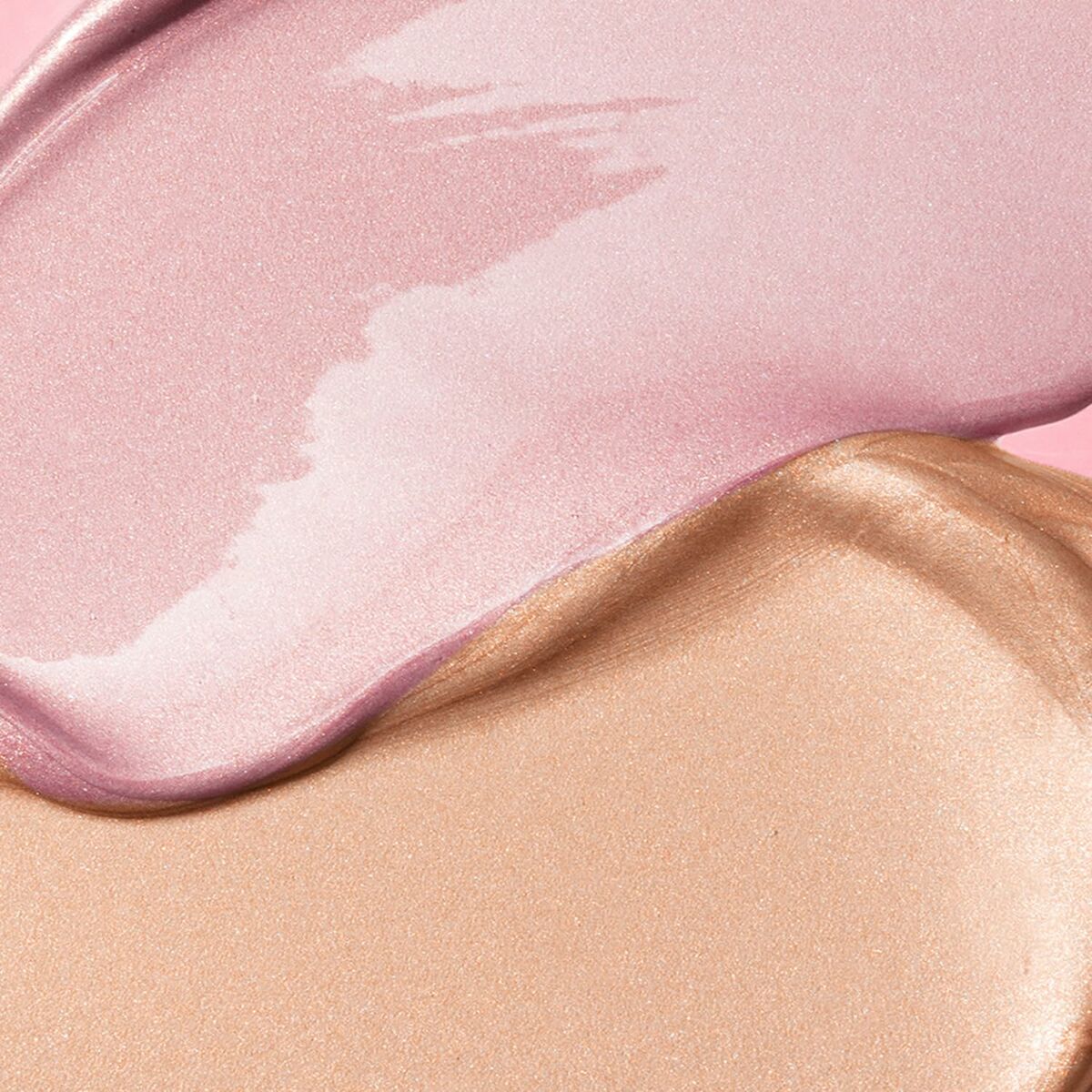 Texture of shimmering pink and gold makeup cream swatches, perfect for enhancing natural beauty.
