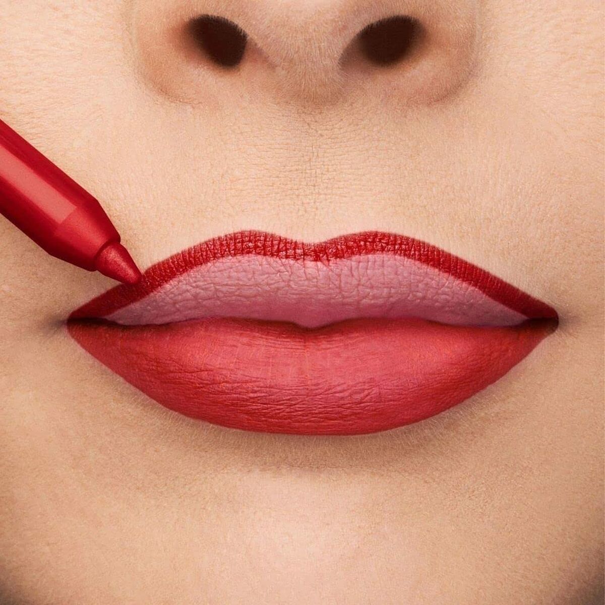 Application of Collistar Professionale Nº 109 Papavero ipnotico lipstick, showcasing bold red lips.