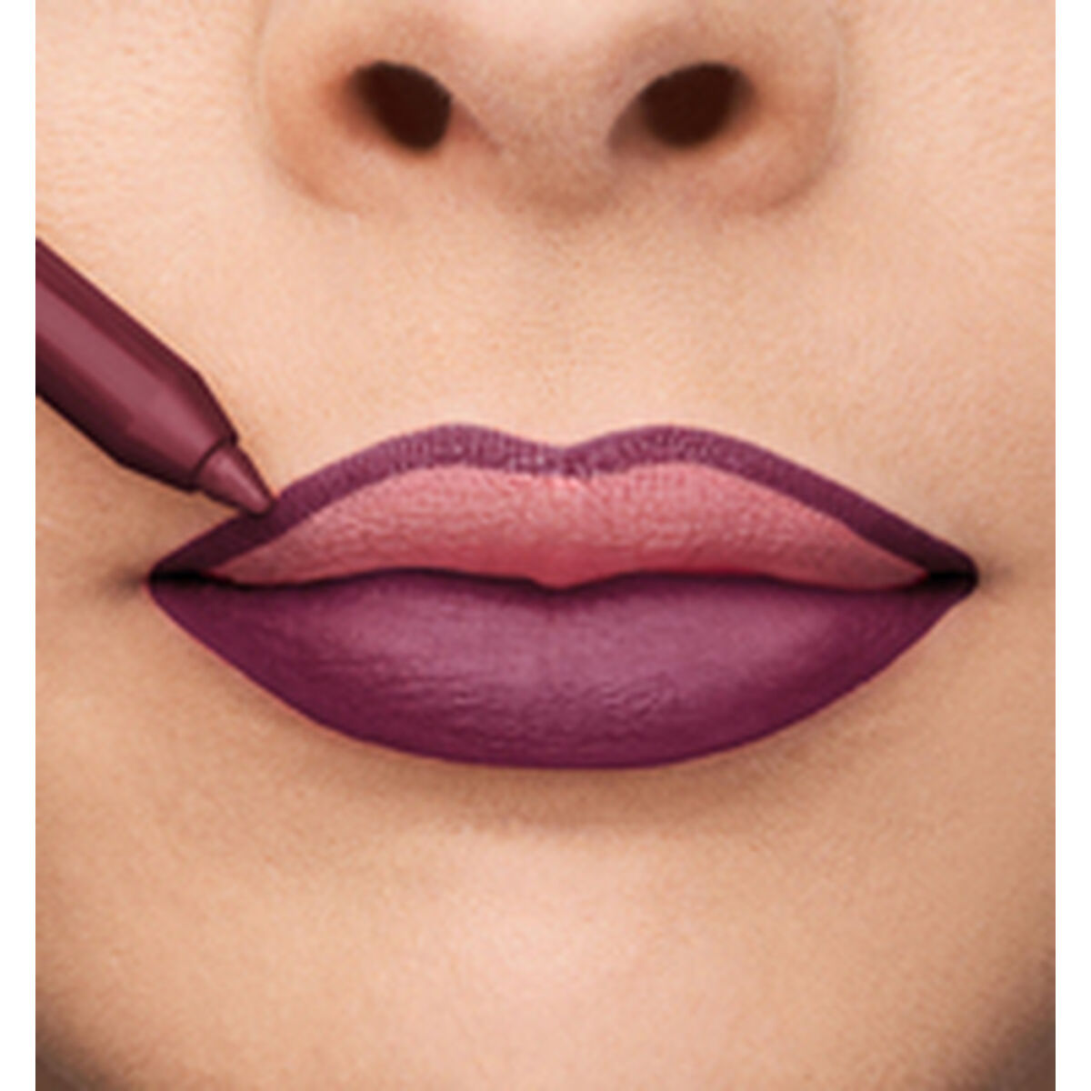Application of deep plum lipstick on lips with a lip liner for a bold makeup look.