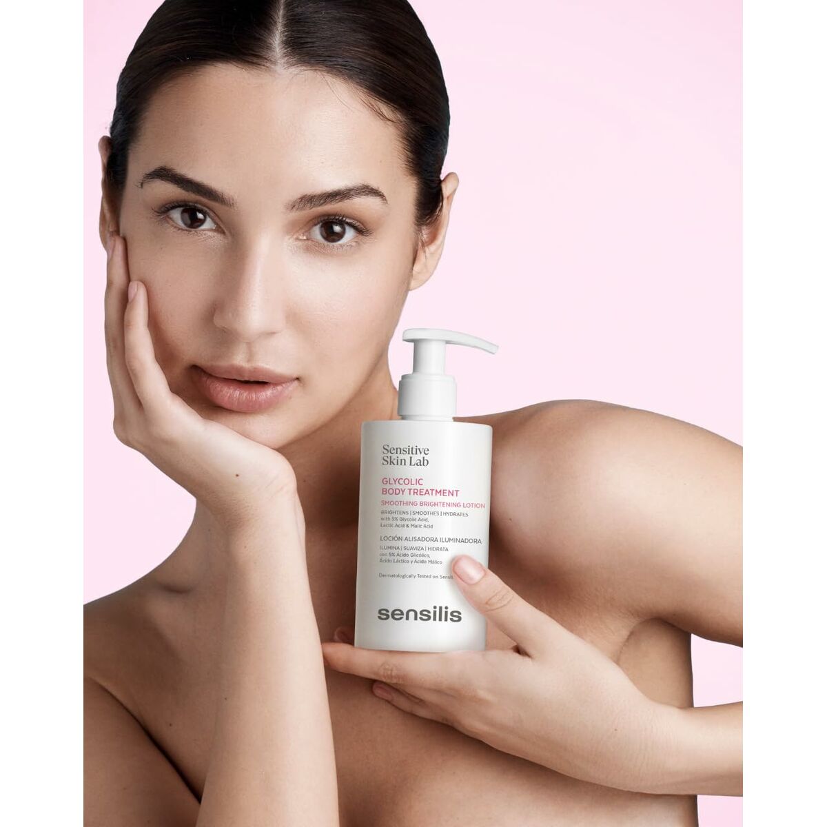 Model holding Sensilis BODY TREATMENT lotion, showcasing its hydrating benefits for all skin types.