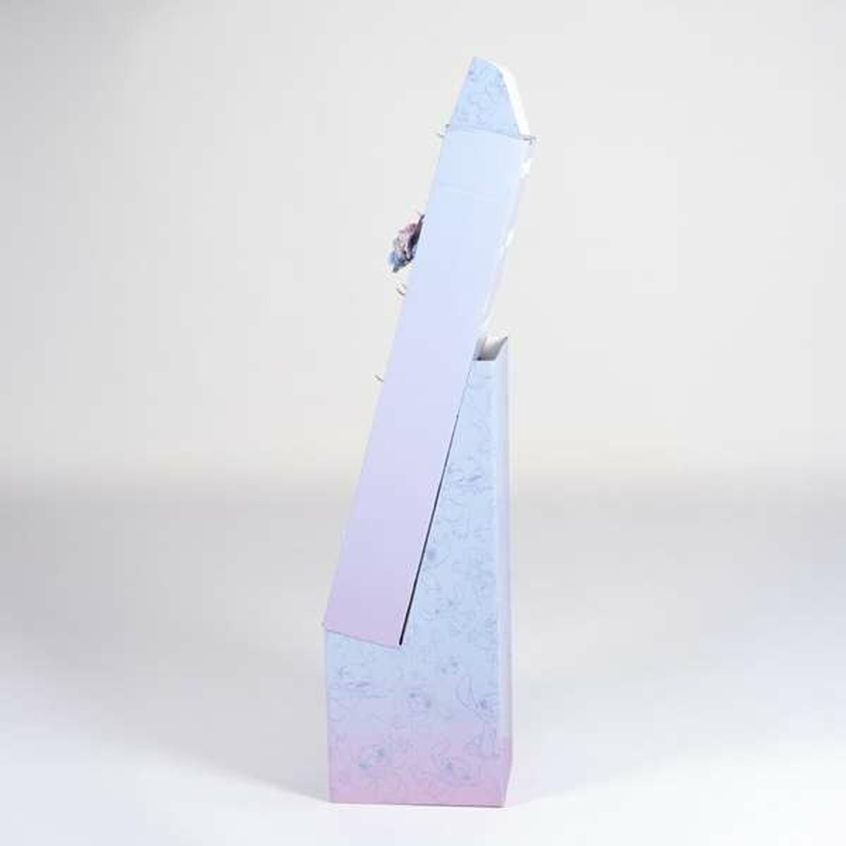 Packaging design of a pastel gradient box with floral accents, displayed upright on a neutral background.